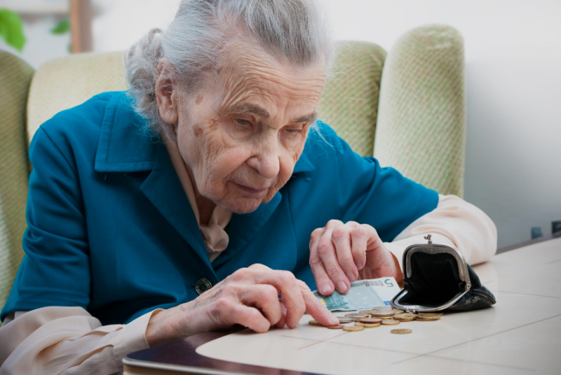 Older woman watching pennies